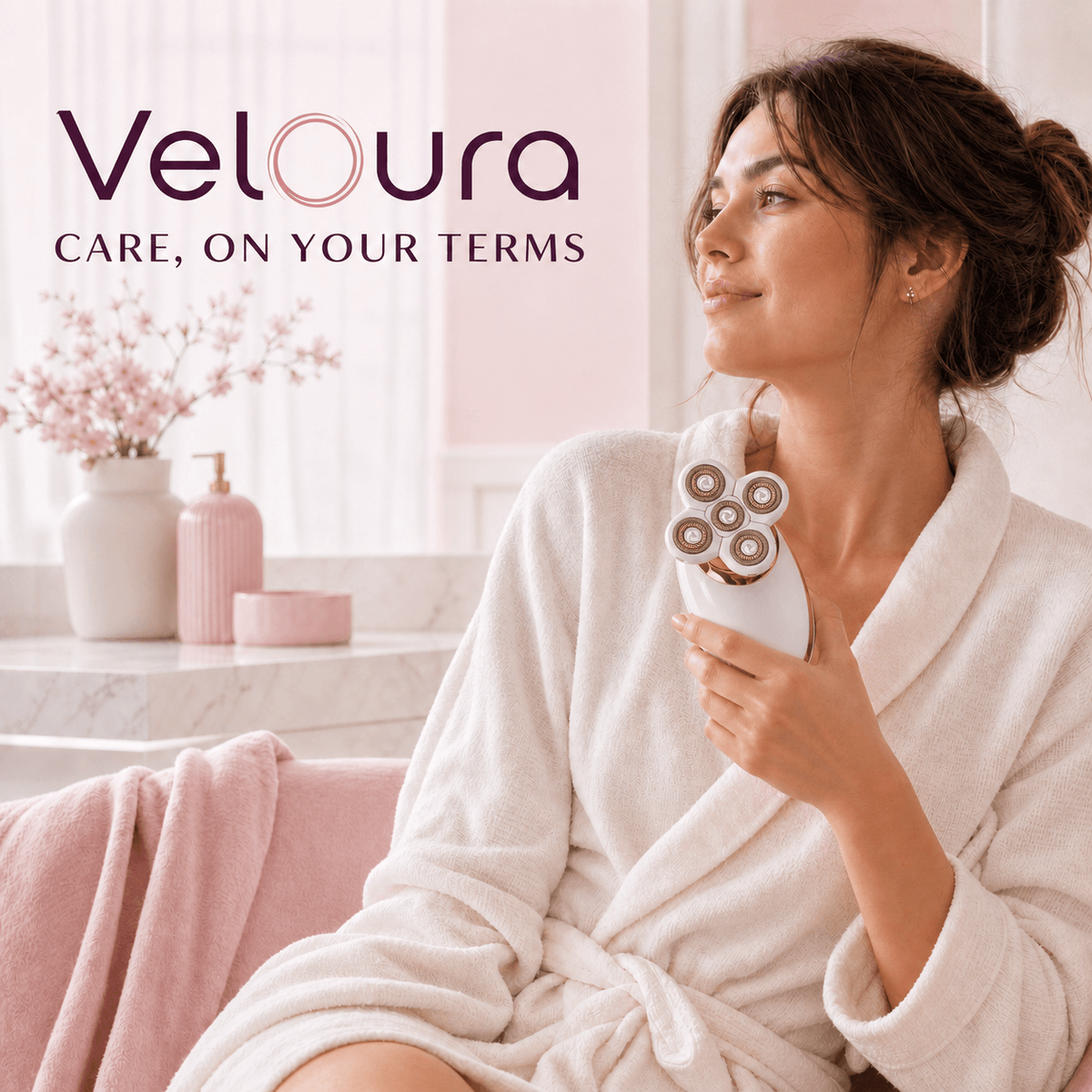 Veloura Premium razor held in a robe, ready for underarms
