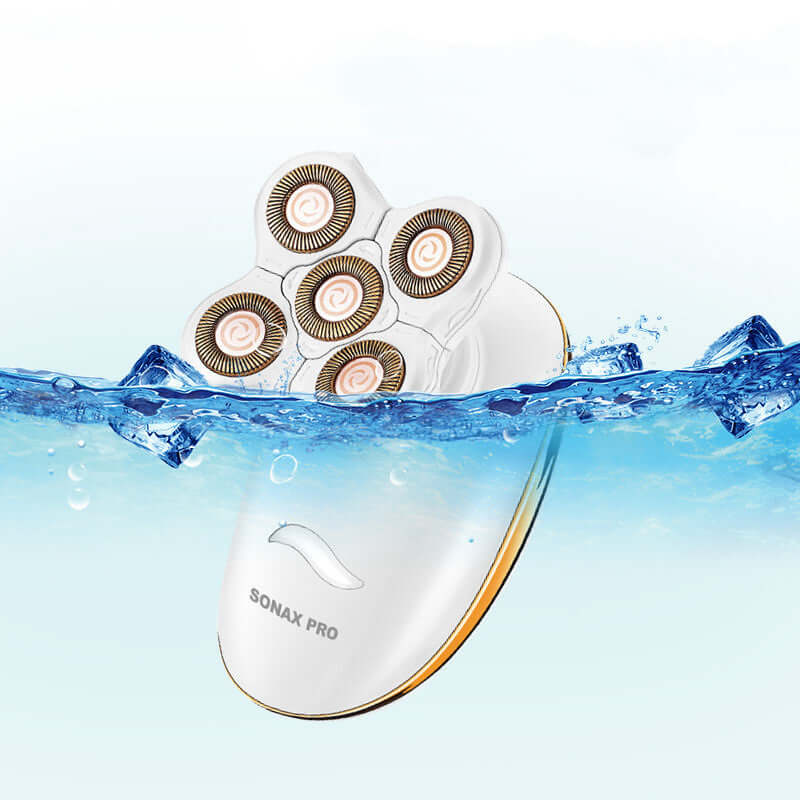 Veloura 3-in-1 electric razor for women, white body with rose-gold trim and five rotary shaving heads, on a plain background